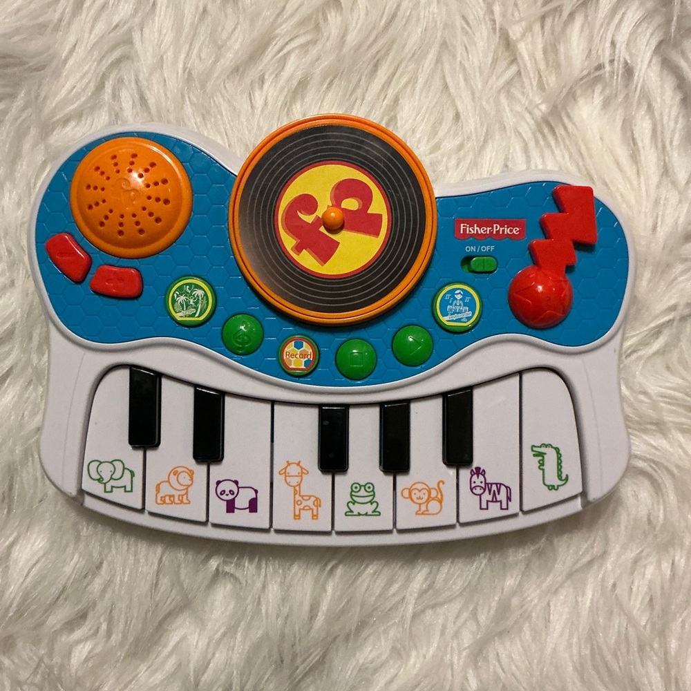 Fisher Price colorful keyboard toy instrument for children